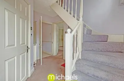 a staircase in a home with purple stairs at For Contractors, businesses, families - next to Colchester Royal Grammar School in Lexden