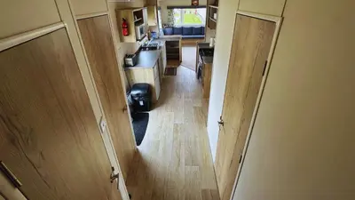 an overhead view of a kitchen in a tiny house at Sunny Beach Holidays Home in Jaywick Sands