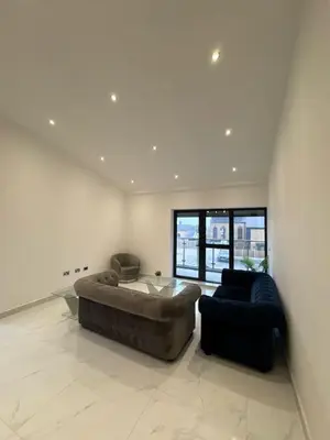 a large living room with a couch and a chair at Amazing 3-bedroom in Great Warley, Brentwood in Great Warley Street