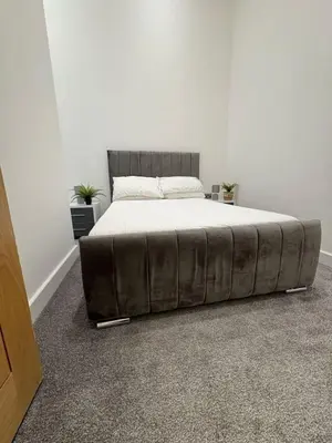 a large bed in a white room with a large mattress at Amazing 3-bedroom in Great Warley, Brentwood in Great Warley Street