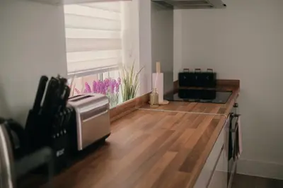a kitchen with a counter with a microwave and a window at Modern Stay - Walk to Everything 4 in Ipswich
