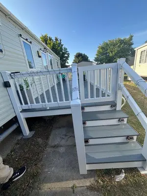 a staircase leading up to a mobile home at Singh&Leite Family RF10 in Jaywick Sands