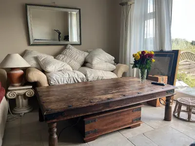 a living room with a couch and a coffee table at Valley View in Sudbury