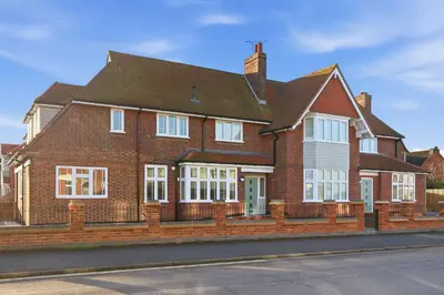 a red brick house with a brown roof at 2 Royal Serviced Apartments, Ground Floor, two Bed,Fast Wifi - Space in Parkeston