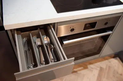 a drawer in a kitchen with utensils at 6 The Royal Serviced Apartments, Harwich - Fast WiFi, Private Parking in Parkeston