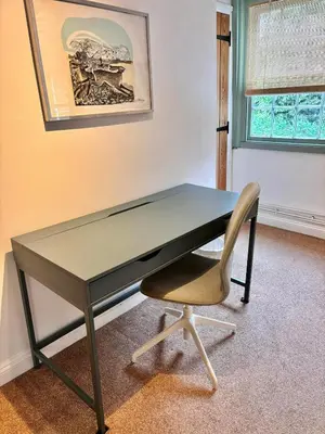 a desk with a chair in a room at One Threadneedle Street, Dedham in Dedham