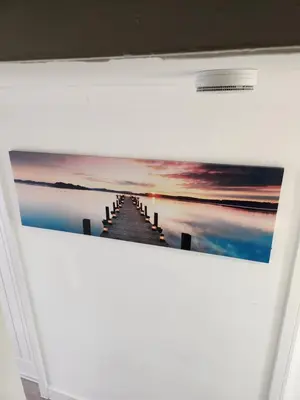 a painting of a pier over the water at Luxurious ensuite rooms in Basildon