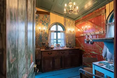 a bathroom with a sink and a window in it at Romantic 1920s Circus Wagon Experience in Sutton