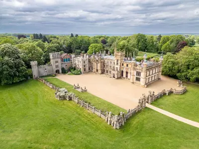 an aerial view of a castle with people walking around it at Finest Retreats - Hollybush Studio in Knebworth