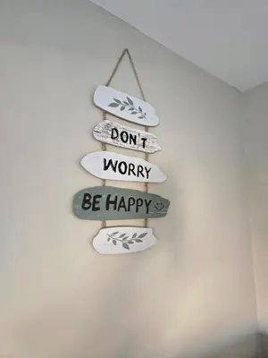 a sign that says dont worry be happy at Spacious & Homely Colchester Stay-Great Location in Hythe