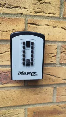 a remote control on the side of a brick wall at Crystalsspace in Braintree