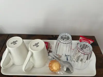 a tray with two measuring cups and a blender at The Meadow Garden Guest Room in Newmarket