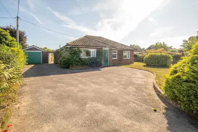 a house with a driveway in front of it at 18 Linden Road - sleeps 5 - Less than a mile from the Aldeburgh Beach and a Vibrant High Street in Aldeburgh