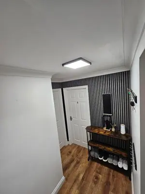 a room with a hallway with black and white stripes at Apartment Royston Center in Royston