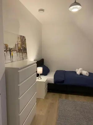 a bedroom with a bed and a dresser at Modern Stay - Walk to Everything 6 in Ipswich
