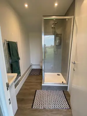 a bathroom with a shower and a sink at The Old Stable in Messing