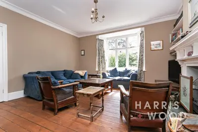 a living room with a couch and a table at Beaulieu in East Bergholt