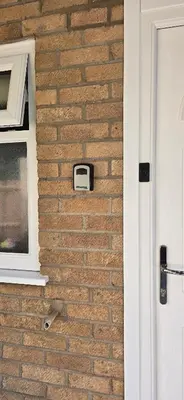 a brick wall with a window and a door at Grace's Place in Littleport in Littleport