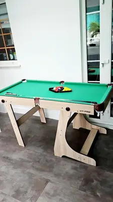 a ping pong table with a green cloth on it at Relaxed Leigh-on-Sea Escape, Family-Friendly & Contractor Stays in Hockley