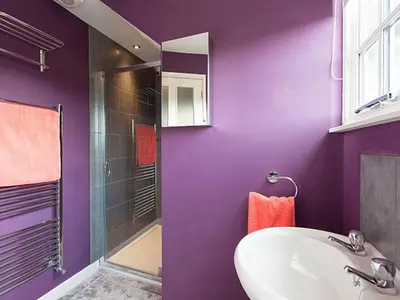 a purple bathroom with a sink and a shower at The Porterhouse Pub & Restaurant Cambridge in Willingham