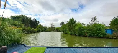 a view of a river from a boat at Lily Lake Lodge in Chelmsford
