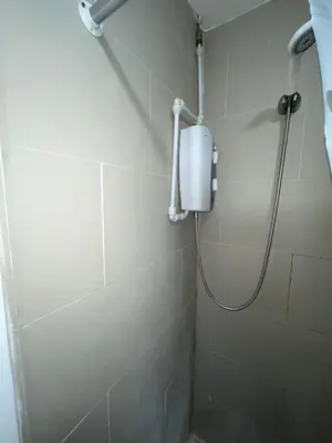 a shower in a bathroom with a shower at Cosy Studio in Stevenage