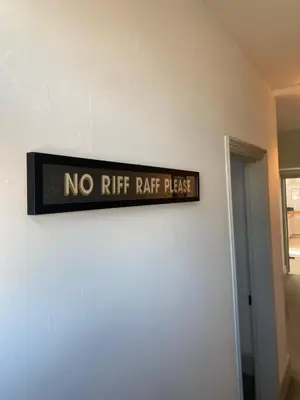 a no riff rail pass sign on a wall at Three Bedroom Home Close to central Cambridge in Chesterton