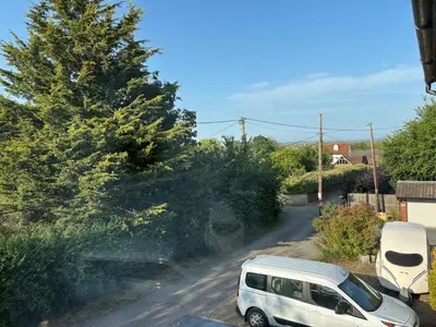 a white van parked on the side of a road at Fernleigh - Lovely Self Catering Apartment in Tollesbury in Tollesbury