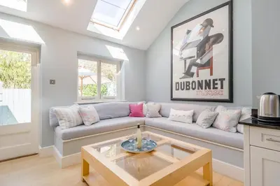 a living room with a couch and a table at 3 Bed in Aldeburgh oc-f32700 in Aldeburgh