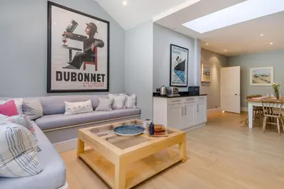 a living room with a couch and a table at 3 Bed in Aldeburgh oc-f32700 in Aldeburgh