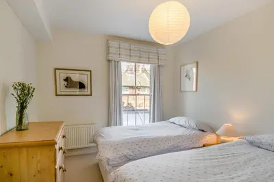 a bedroom with two beds and a window at 3 Bed in Aldeburgh oc-f32700 in Aldeburgh