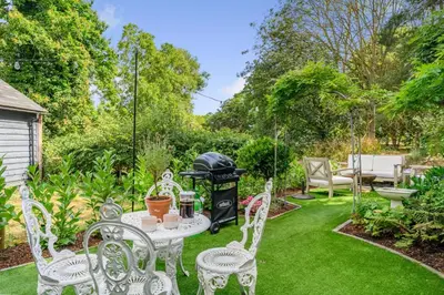 a patio with a table and chairs and a grill at 2 Bed in Dedham oc-c32543 in Dedham