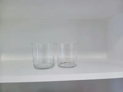 two glass vases sitting on a shelf at Private En-Suite Room by Christchurch Park - room 6 in Ipswich