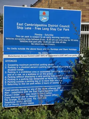 a sign for a free long stay car park at Deluxe One Bed Flat at Dawe Luxury Suites - An Entire Apartment near Ely Cathedral & Train Station - Ideal Gateway to Explore Ely, Cambridge, Norfolk & London - Sleeps up to 4 in Ely
