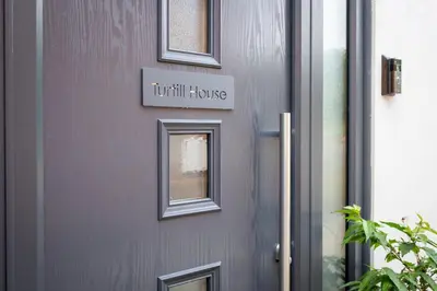 a front door with a truth house sign on it at Detached House in Quiet Village - Pets Allowed in Ipswich