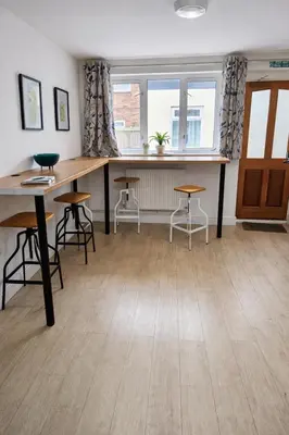 a room with desks and chairs and a window at Free Parking-Modern Rooms in Central Cambridge Guest House by Luxiety Stays Near University in Cambridge