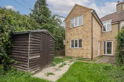 a shed in the yard of a house at 4 BDR I sleeps 8 I Wi-FI I Free Parking I Central in Chesterton