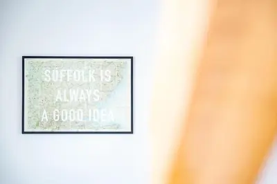 a picture frame on a wall with a quote about auddle is always a good at Heath House 6 in Thorpeness