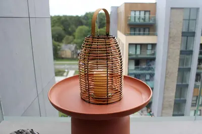 a wicker basket sitting on top of a table at Stylish Essex Apartment, Balcony & Scenic Views in Harlow