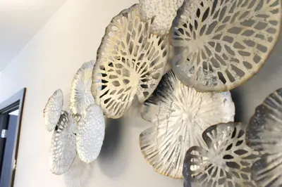 a group of paper butterflies hanging on a wall at The Ivy Abode, Stylish 2-Bed Apartment Free Parking in Harlow