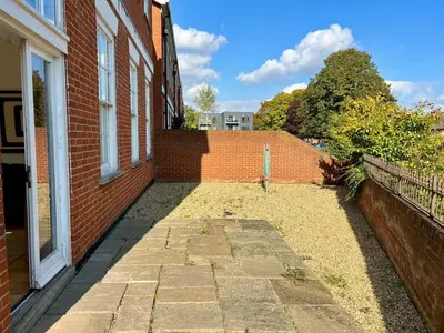 an empty courtyard of a brick building at Fabulous 2 bed in Leiston in Leiston