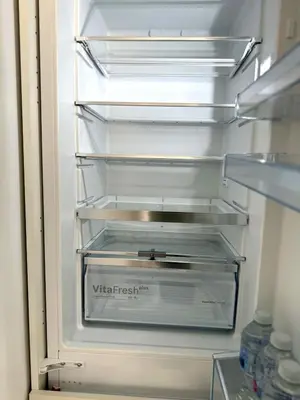 an empty refrigerator with its door open with its at Cosy Central Colchester Home by Castle Park in Colchester