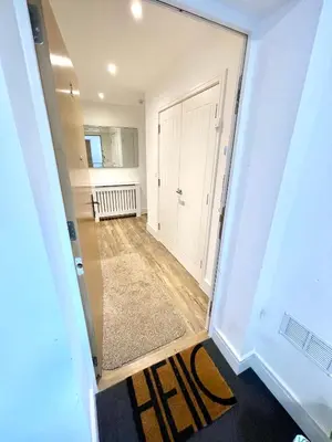 a view from the hallway of a house at Modern cosy 2 bed, free parking Bishops Stortford in Bishops Stortford