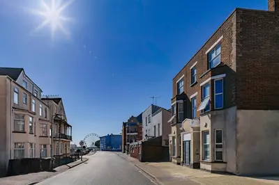 an empty street in a city with buildings at Triple B Aparto in Clacton-on-Sea