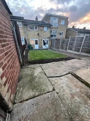 a brick house with a fence in front of it at 3 Bed Home, Sleeps 7 with Garden in Basildon in Basildon