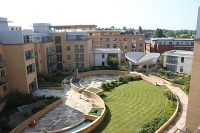an aerial view of a garden with buildings at The Luxurious Penthouse in Cambridge