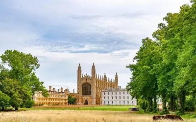 a large building with a tower and a church at Luxury Boutique 'Duchess Suite' in Historic Centre in Cambridge