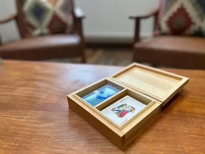a wooden box sitting on a wooden table at Luxury Retreat with Spa Access - Sleeps 6 in Peldon
