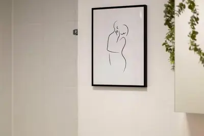 a framed drawing of a woman on a wall at Pass the Keys Ground Floor Apartment with Free Parking in Cambridge