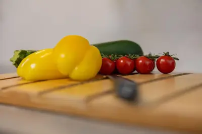 a group of vegetables sitting on a cutting board at Top Step Cottage in Aldeburgh
